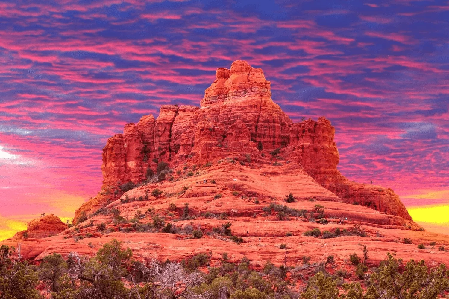 A red rocky Hill view with red and blue sky. A mesmerizing scenic view