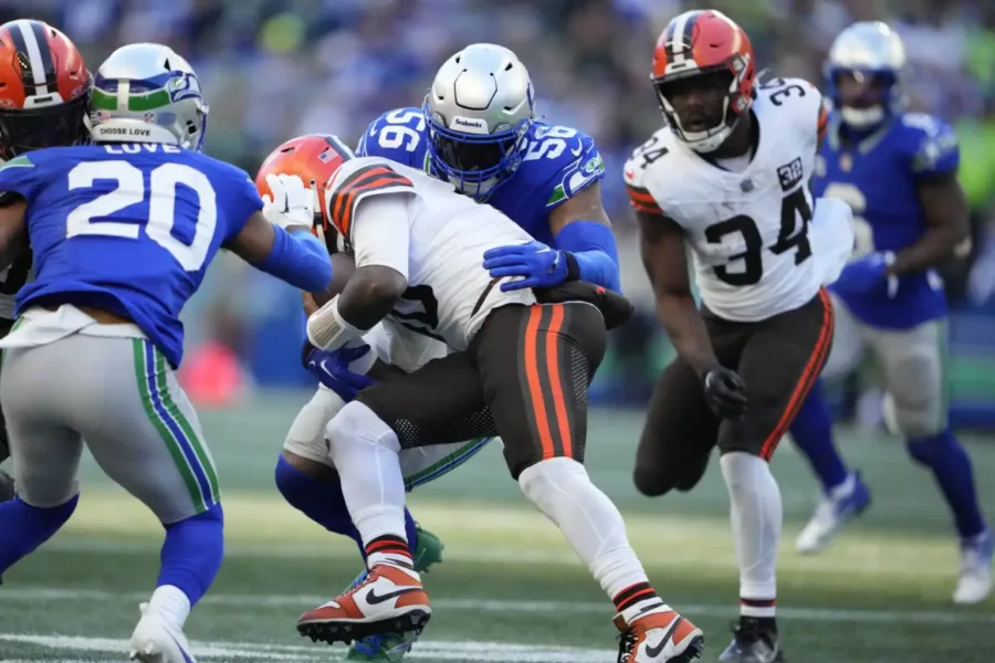 Seattle Seahawks linebacker Jordyn Brooks (56) tackles Cleveland Browns quarterback PJ Walker during the second half of a Sunday’s game in Seattle. The Seahawks won 24-20. (AP Photo/Lindsey Wasson)


